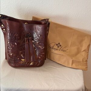Patricia Nash Rich Brown Floral Embossed Bag. Never carried. New without tags.